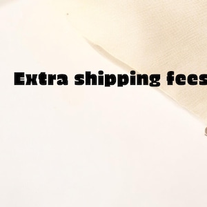 May include: Text on a white background that reads "Extra shipping fees".
