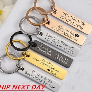 May include: A collection of personalized keychains in various metallic finishes, including gold, silver, and rose gold. Each keychain features engraved text, such as coordinates, names, and phrases like "Best Friend Forever."