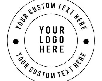 May include: A circular black and white graphic design featuring a central area with the text YOUR LOGO HERE. The outer ring contains the text YOUR CUSTOM TEXT HERE repeated twice, separated by two solid black dots on the left and right sides.