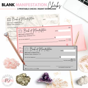 May include: Three printable blank manifestation checks in pink and gray, with the text "Bank of Manifestation." The checks include fields for the date, amount, and payee. A rose gold pen and crystals are also in the image.
