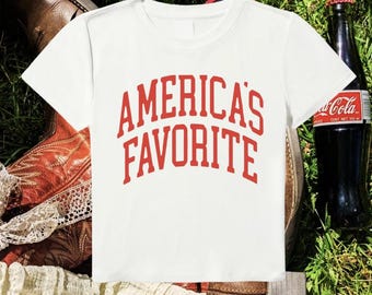 T-shirt bébé préféré de l'Amérique, t-shirt bébé américain, t-shirt bébé 4 juillet, t-shirt vintage, t-shirt bébé rétro, t-shirt western vintage graphique