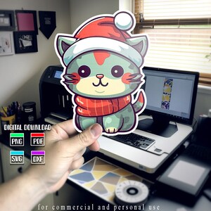ホリデークラフト用のサンタ帽子をかぶったお祭りの子猫のクリップアート、クリスマス猫の衣装、クリスマス猫の看板、