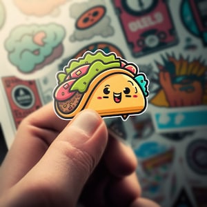 May include: A cartoon taco with a smiling face, wearing a green lettuce hat and a blue and white sauce. The taco is holding a red and yellow filling.