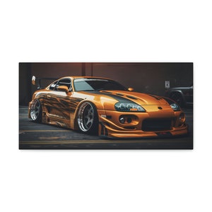 Mk4 Toyota Supra dans une peinture de course orange et noire frappante - Parfait pour les amateurs de voitures !