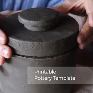 May include: A grey ceramic jar with a lid, the jar is being held by two hands. The text "Printable Pottery Template" is visible on the image.