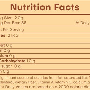 May include: Nutrition Facts label with serving size of 2.0 grams and servings per box of 85. The label lists calories, total fat, sodium, potassium, total carbohydrate, added sugar, and protein. The label also includes the percentage of daily value for each nutrient.
