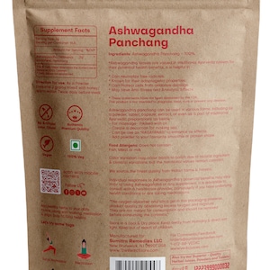May include: Brown paper bag with a red and white label for Ashwagandha Panchang, a 100% natural supplement. The label includes information about the product's ingredients, benefits, and usage instructions. The bag also features a QR code for scanning with a mobile camera and a follow us link.