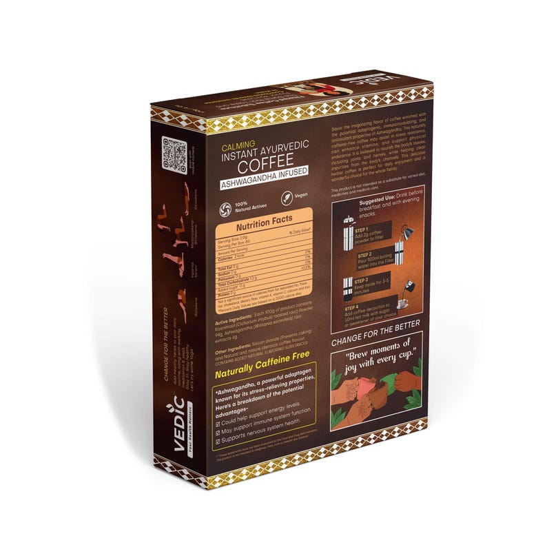 May include: A brown box with gold trim, featuring a picture of a hand holding a cup of coffee. The box is for calming instant ayurvedic coffee infused with ashwagandha. The text on the box reads "Change for the better" and "Brew moments of joy with every cup."