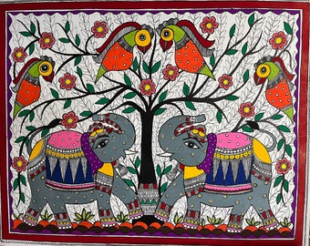 May include: A colorful folk art painting depicting two gray elephants with intricate patterns on their bodies, standing under a tree with green leaves and red flowers. Four colorful birds with yellow beaks are perched on the branches.