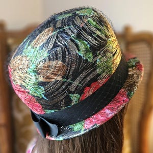 Vintage 1950s Pasadena Floral Multicolor Pillbox Hat with shimmer netting and black bow – Jackie O Style – With Original Woolf&#39;s Hat Box