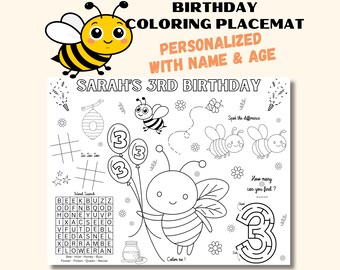 May include: A rectangular birthday coloring placemat featuring black and white line art of bees, flowers, balloons with the number 3, a tic-tac-toe grid, a word search, and a maze. The text reads "SARAH'S 3RD BIRTHDAY" and "BIRTHDAY COLORING PLACEMAT".