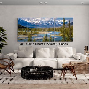 Stunning Canadian Rockies art print. scenic mountains turquoise water landscape print featuring a braided river valley near Saskatchewan Crossing. This dramatic mountain scene is available as an acrylic, canvas, or metal wall art print, perfect for rustic, nature, or adventure-themed decor. The majestic peaks and winding river create a breathtaking view ideal for cabin, lodge, or modern interiors. Alberta Canada Icefields parkway landscape. bow river valley art wilderness 40x90 3 panel print