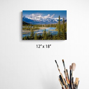 Canadian Rockies art print. landscape featuring a braided river valley near Saskatchewan Crossing. This dramatic mountain scene is available as an acrylic, canvas, or metal wall art print, perfect for rustic, nature, or adventure-themed decor. The majestic peaks and winding river create a breathtaking view ideal for cabin, lodge, or modern interiors. Alberta Canada Icefields parkway landscape. bow river valley art