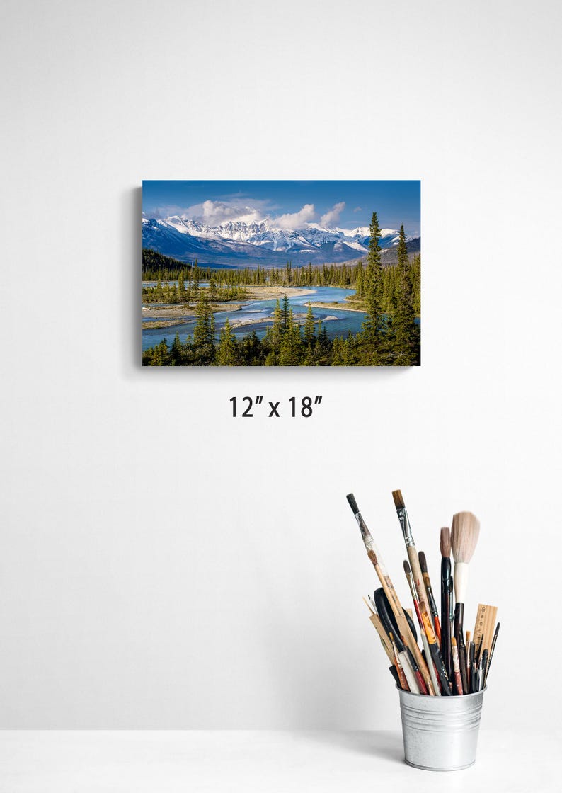 Canadian Rockies art print. landscape featuring a braided river valley near Saskatchewan Crossing. This dramatic mountain scene is available as an acrylic, canvas, or metal wall art print, perfect for rustic, nature, or adventure-themed decor. The majestic peaks and winding river create a breathtaking view ideal for cabin, lodge, or modern interiors. Alberta Canada Icefields parkway landscape. bow river valley art