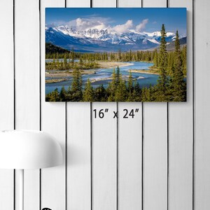 Canadian Rockies art print. landscape featuring a braided river valley near Saskatchewan Crossing. This dramatic mountain scene is available as an acrylic, canvas, or metal wall art print, perfect for rustic, nature, or adventure-themed decor. The majestic peaks and winding river create a breathtaking view ideal for cabin, lodge, or modern interiors. Alberta Canada Icefields parkway landscape. bow river valley art