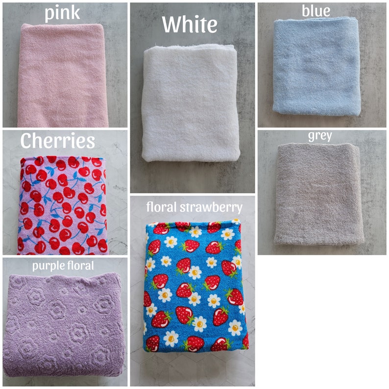 Op de afbeelding: Assortiment van 10 verschillende stofstalen in verschillende kleuren en patronen, waaronder roze, wit, blauw, grijs, kersen, bloeiende aardbei en paarse bloemen.
