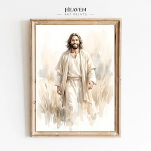 May include: A framed watercolor art print featuring a smiling figure with long brown hair and a beard, wearing a light-colored robe and shawl. The figure stands in a field of tall grass rendered in soft beige and cream tones. Text reads HEAVEN ART PRINTS.