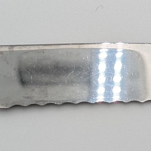 Vintage c. 1950s (?) / 1960s | EKCO Eterna | Stainless Steel | Serrated Carving Knife | Wood Handle, Brass Studs | Made in U.S.A. | MCM