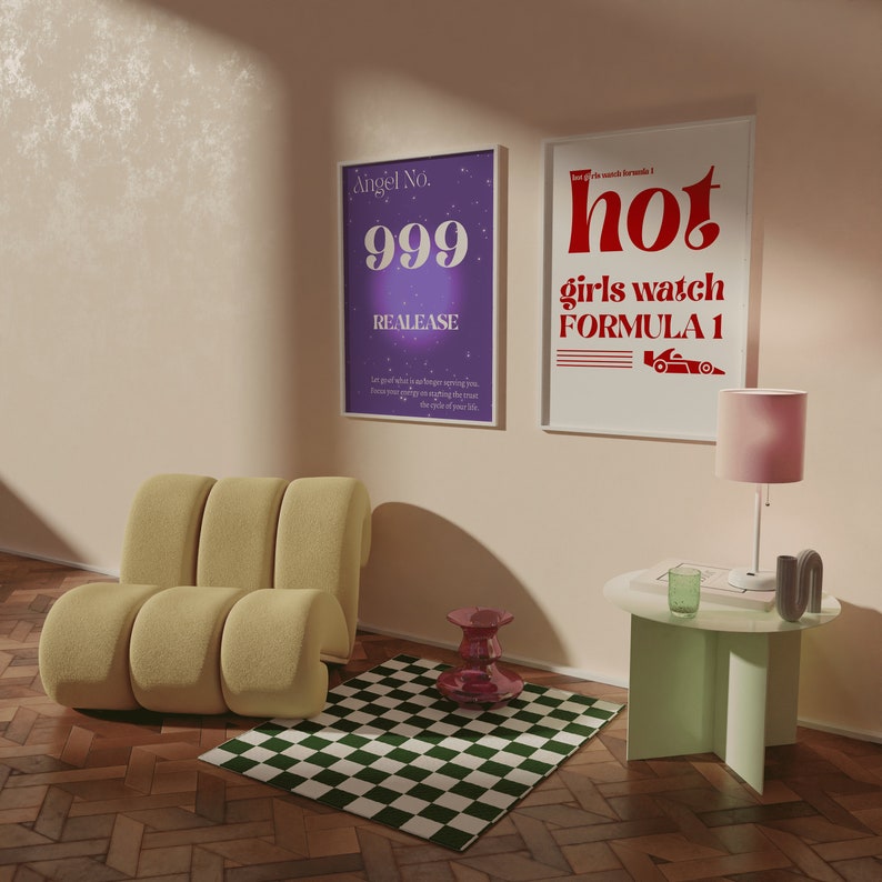 May include: A living room interior with a yellow sofa, a green and white chequered rug, a pink lamp, a green side table, a red and purple stool, and two framed posters. The posters have the text "Angel No. 999 Realease" and "Hot girls watch Formula 1".