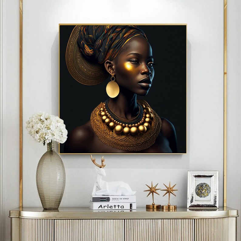 May include: A black and gold portrait of a woman wearing a gold head wrap, large gold earrings, and a thick gold necklace. The background is black.