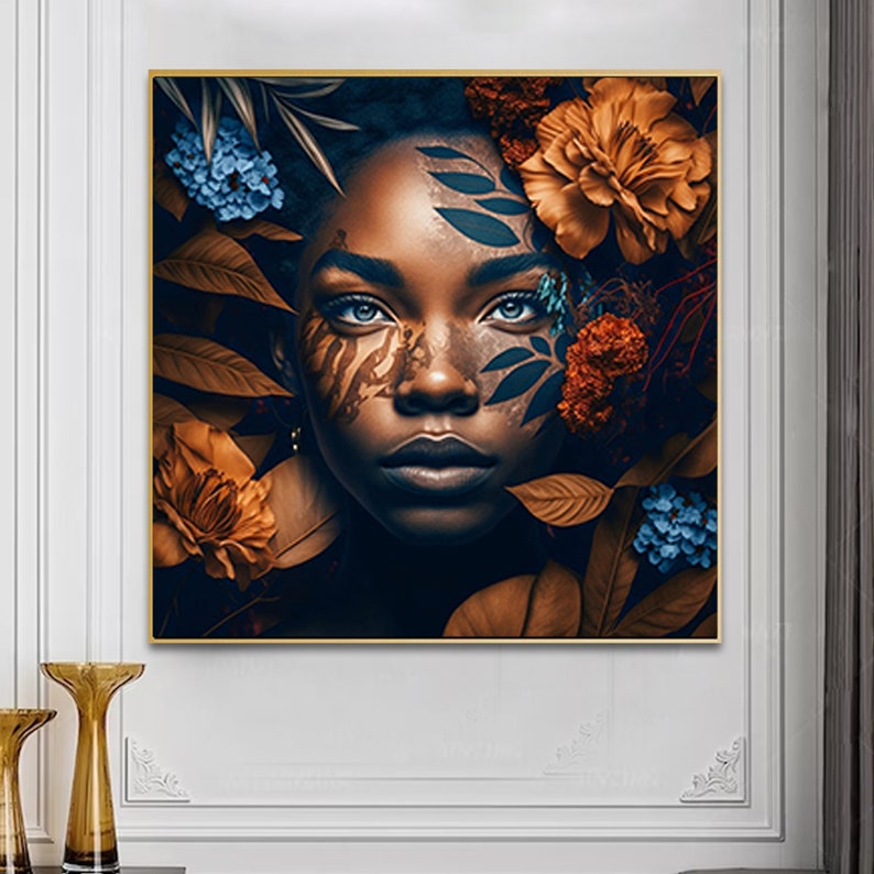 May include: A close-up portrait of a woman with dark skin and blue eyes. Her face is painted with intricate patterns of black and brown, and she is surrounded by lush foliage and flowers in shades of orange, blue, and green.