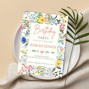 May include: A floral birthday party invitation with a white background and a pink and white floral border. The text reads "Birthday Party" in a cursive font with a pink heart. The invitation includes the name "Sarah Jones", the date "June 23", the time "1PM-4PM", the location "Sarah's Home, 251 Montreal Ave Regina, CA", and the RSVP information "RSVP to Sarah at 987-123-4567".