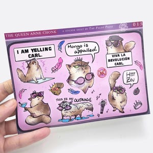 May include: A rectangular sticker sheet titled The Queen Anne Chonk by The Paleo Press featuring various illustrations of cats. The cats are depicted in different poses with speech bubbles containing text such as I AM YELLING CARL, Mongo is appalled, VIVA LA REVOLUCIÓN CARL, Hiii Zev, and THIS IS AN OUTRAGE.