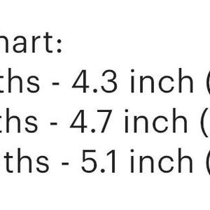 May include: Size chart for baby clothes showing measurements in inches and centimeters. 0 months - 4.3 inches (11 cm), 6 months - 4.7 inches (12 cm), 12 months - 5.1 inches (13 cm).