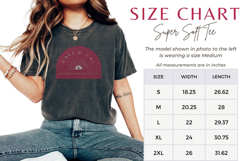 May include: A charcoal grey t-shirt with a maroon arch graphic featuring a sun and the text CALI & CAI. Next to the shirt is a size chart titled SIZE CHART Super Soft Tee, listing sizes S through 2XL with width and length measurements in inches.
