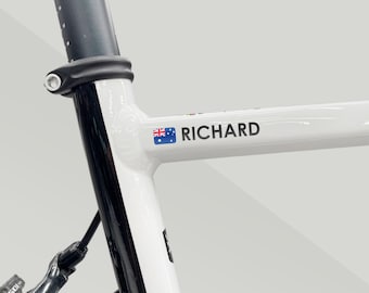Custom Cyclist Name and Flag Decals made from high-quality waterproof vinyl designed for outdoor use, racing and casual riding (Set of 2)