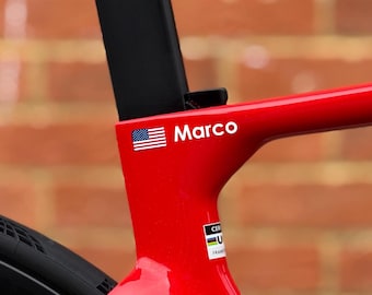 Custom Cyclist Name and Flag Decals made from high-quality waterproof vinyl designed for outdoor use, racing and casual riding (Set of 2)