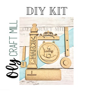 May include: DIY craft kit for making a St. Patrick's Day sign. The kit includes a wooden sign with the words "Happy St. Patrick's Day" and a shamrock, a wooden hat, a wooden post, and a wooden sign with the words "Craft Mill".