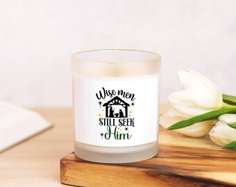 May include: A white frosted glass candle with a black and white image of the nativity scene and the text "Wise men still seek Him".