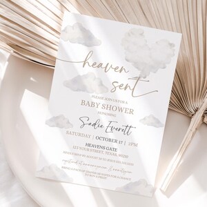 May include: A baby shower invitation with a watercolor design of clouds in shades of blue and gray. The text reads "heaven sent" and includes the name "Sadie Everett" and the date and time of the event.