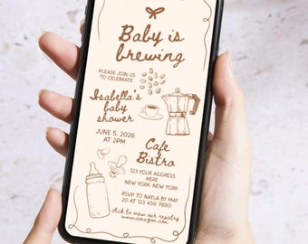 May include: A smartphone displays a baby shower invitation with the text "Baby is brewing." The invitation features illustrations of a coffee pot, coffee beans, a baby bottle, and a pacifier. The event is for Isabella, at Cafe Bistro, June 5, 2026.