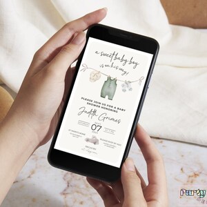 May include: A digital baby shower invitation with a green and white watercolor illustration of baby clothes hanging on a clothesline. The text reads "a sweet baby boy is on his way!" and "Please join us for a baby shower honoring Judith Grimes".