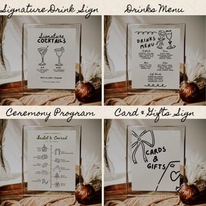 May include: Four framed signs with black handwritten text on white paper. The signs are titled "Signature Drink Sign", "Drinks Menu", "Ceremony Program", and "Card & Gifts Sign". The signs are in gold frames and are sitting on a table with a brown surface.