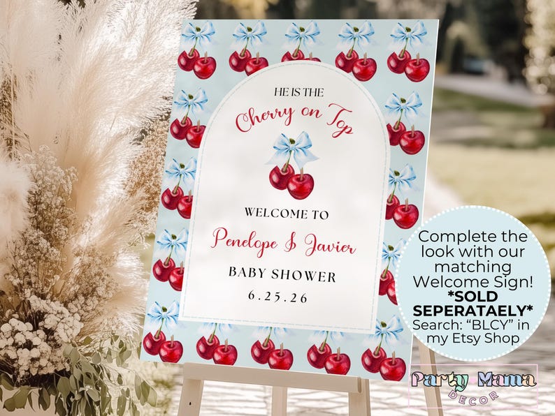 May include: A blue and white baby shower sign with a cherry theme. The sign says "He is the Cherry on Top" and "Welcome to Penelope & Javier Baby Shower 6.25.26".