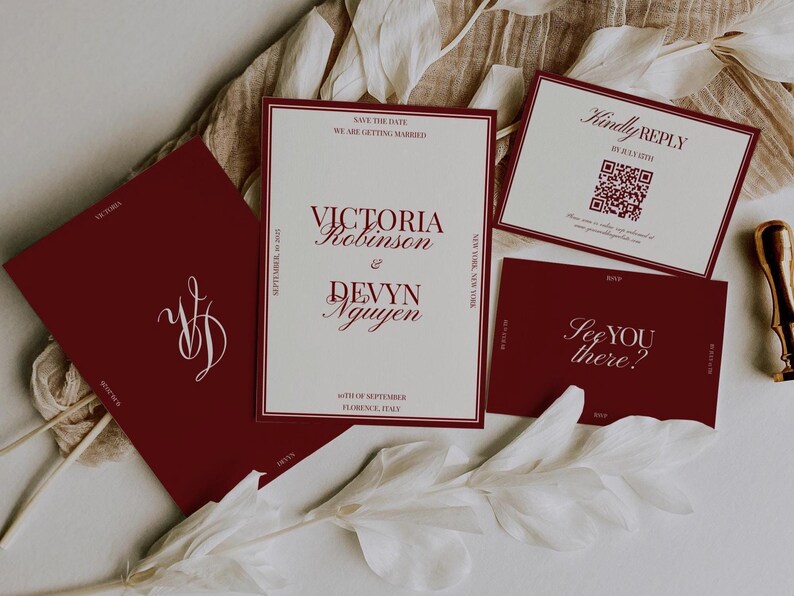 May include: Burgundy wedding invitation suite with a cream-colored background. The main invitation features the names "Victoria Robinson & Devyn Nguyen" and the date. Other cards include "Kindly Reply" and "See you there?"