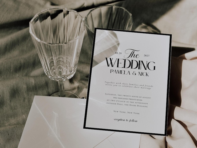 May include: A black and white wedding invitation with the text "The Wedding" in a bold, modern font. The names "Pamela & Nick" are listed below the title. The date of the wedding is listed as "03.29.2027". The invitation includes the time and location of the wedding ceremony and reception.