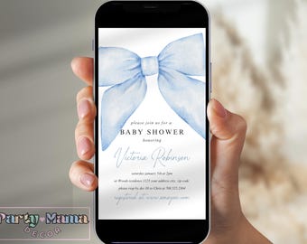 May include: A blue watercolor bow on a white background with text that reads "Please join us for a Baby Shower honoring Victoria Robinson Saturday January 15th at 2pm at Woods residence 1123 your address city, zip code please rsvp by dec 10 to Ches at 708 325.2304 registered at www.amazon.com"