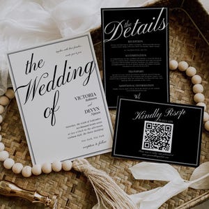 May include: Elegant wedding invitation suite featuring a main invitation, details card, and RSVP card. The invitations are black and white with elegant script fonts. The main invitation reads "The Wedding of Victoria Robinson and Devyn Nguyen."