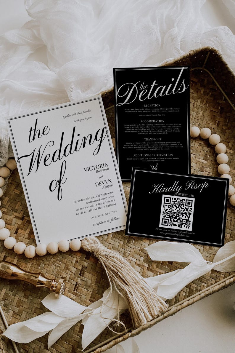 May include: Elegant wedding invitation suite featuring a main invitation, details card, and RSVP card. The invitations are black and white with elegant script fonts. The main invitation reads "The Wedding of Victoria Robinson and Devyn Nguyen."