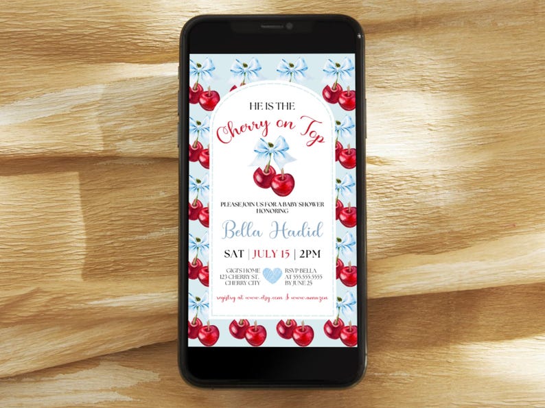 May include: A blue and white baby shower invitation with a cherry theme. The invitation says "He is the Cherry on Top" and includes the name "Bella Hadid" and the date "Sat July 15 | 2PM".