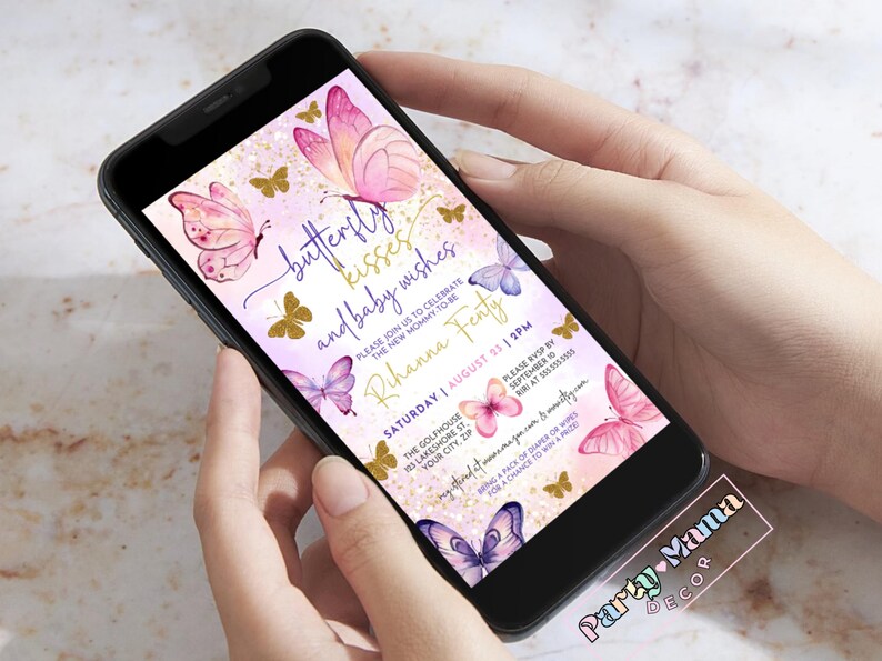 May include: A pink and purple baby shower invitation with a butterfly theme. The invitation features a pink and purple butterfly with gold glitter accents. The text on the invitation reads "butterfly kisses and baby wishes".