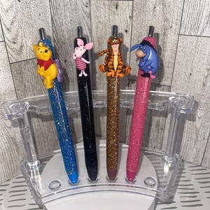 Bolígrafos con purpurina de Winnie the Pooh y sus amigos