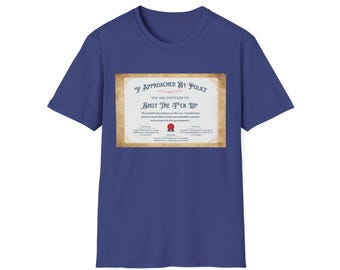 May include: A blue t-shirt with a white framed certificate that reads "If Approached By Police You Are Entitled To Shut The F*ck Up". The Fourth Amendment in the U.S. Constitution protects individuals from unreasonable searches and seizures by the government.