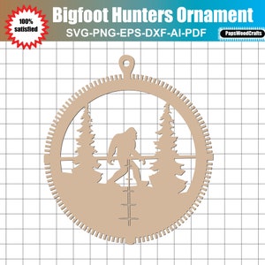 May include: A brown wooden ornament shaped like a circle with a silhouette of Bigfoot walking through a forest. The ornament has a hole at the top for hanging.
