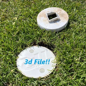 May include: Two white plastic covers for an outdoor utility access point. The cover on the left has the text "3d File!!" printed on it.