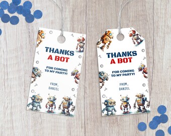 May include: Two white robot party favor tags with blue and red accents. The tags feature the text "Thanks a Bot" and "For coming to my party!" with the name "Daniel" at the bottom.